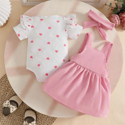 Completo Neonata 3 Pezzi – Vestito con Body a Cuori, Gonna Salopette e Fascia