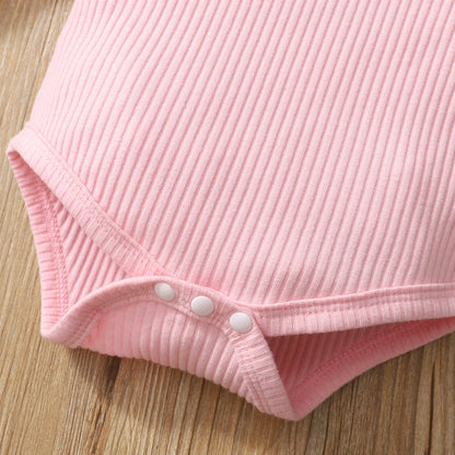 Set Neonata 3 Pezzi – Body a Coste con Volant, Pantaloni Mimetici e Fascia con Fiocco